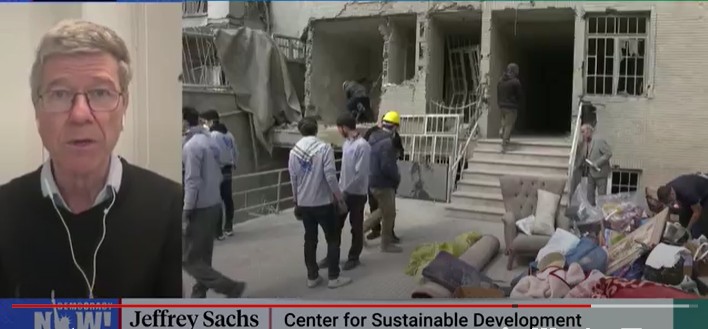 man in sweater, people outside damaged building